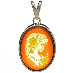 Beautiful oval shaped sterling silver amber cameo pendant. The cameo is hand carved from the back of the pendant. Nicely detailed. Size is approx 1.5" x .8".