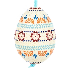 These beautifully designed and executed naturally speckled turkey eggs are hand made by our Polish folk artist from Torun, Poland. The technique used is called wax embossing which is similar to the batik method of decorating pisanki using several layers