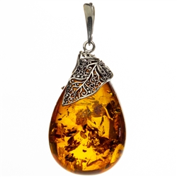 Amber (Bursztyn in Polish) is fossilized tree sap that dates back 40 million years. It comes from all around the world, but the highest quality and richest deposits are found around the Baltic Sea.