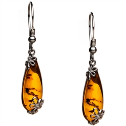 Amber (Bursztyn in Polish) is fossilized tree sap that dates back 40 million years. It comes from all around the world, but the highest quality and richest deposits are found around the Baltic Sea.