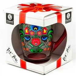 This bright glass mug is decorated with a beautiful Polish paper cut design.  Red handle and base.  Hand wash only.