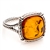 Honey colored amber and sterling silver rope style ring. Size approx. .6" square.