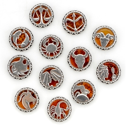 Sterling silver with Cognac Amber. Size - .75" diameter.