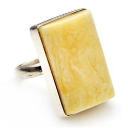 Beautiful milky custard amber set in sterling silver.  Size is approx. 1.1" x .75".  This is the only one available.