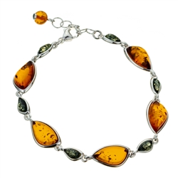 11 elegant drops of amber each set in sterling silver. Bracelet length is 8" long and adjustable smaller.