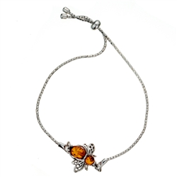 This adjustable sterling silver bracelet features a silver and amber honey bee. Bracelet can be adjusted to a maximum 8.5" diameter.