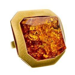 Sparkling honey amber cabochon set in a gold vermeil adjustable (one time) ring. Size approx. 1" x 1" x .5".