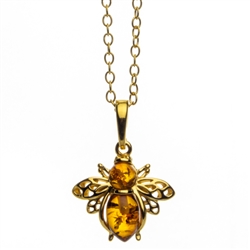 Gold plated sterling silver honey bee with beautiful honey amber drops. Pendant size is approx. 1" x .75".