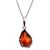 A beautiful cherry amber cabochon framed in an open back sterling silver frame. Pendant size is approx. 1" x .5".