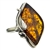 A beautiful amber cabochon framed in a classic sterling silver frame. Size is approx 1.25" x 1".