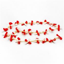 Decorate your home with a little bit of Polish folk art. This colorful paper and straw garland (Lancuch) is made entirely by hand by a single family from the Lublin area where ornaments made of straw is an old tradition. Red and white are the colors of