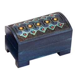 This box is decorated in blue, green and natural wood colors.  Patterns are surrounded with inlaid brass on the lid.