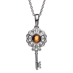 Beautiful sterling silver and amber pendant.  Key size is approx. 1" x .25".