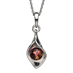 Artistic sterling silver and amber pendant with adjustable length chain. Calla lily length is approx. .75 x .25" wide.