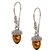Charming sterling silver acorn shaped amber earrings. Size is approx 1" x .25"