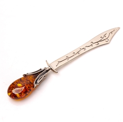 Sterling silver and amber letter opener. Lightweight, makes opening letters a pleasure!  Looks great on your desk at home or in the office.  Size is approx 5" x .75".