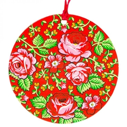Folk art is the perfect souvenir from Poland. This ornament is inspired by the colorful floral patterns worn by the women from the Tatry moiuntain region of southern Poland.