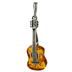 Baltic amber with sterling silver detail. Our musical instrument is approx 1.5" x .5".
