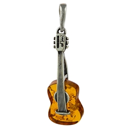 Baltic amber with sterling silver detail. Our musical instrument is approx 1.5" x .5".