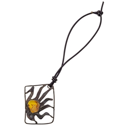 Artistic amber pendant/charm set in a metal frame. We string these on a 4" removable leather cord.  These are hand made so the design will vary slightly.  Frame size is approx 1.75" x 1.25'.