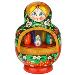 Hand painted wooden  matrushka doll with a musical movement playing "Midnight In Moscow"  The girls inside revolve in a circle. Wind the movement
&#8203;clockwise to play. Caution....do not overwind.  Size is approx 4.5" x 7".Made In Russia.