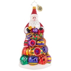 One of Santa's favorite Christmas pastimes is carefully sorting through his collection of treasured glass baubles. He adds something new and special every year!