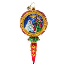 Mary, Joseph and baby Jesus are portrayed on the front of this beautiful ornament with the North Star shining brightly above them for all to see!