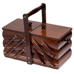 Polish wooden sewing box with expandable pull-out drawers. Handle is removed for shipping.  Small Phillips screwdriver required for assembly.