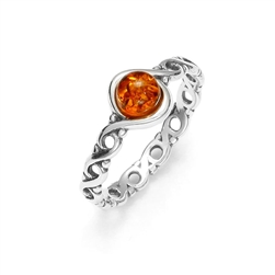 Petite size honey amber set in a braided design band of sterling silver.