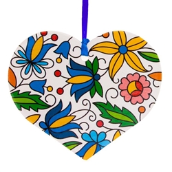Folk art is the perfect souvenir from Poland. This ornament is inspired by Kashubian floral patterns. Made of thick cardboard and paper covered with foil flash. Double-sided printing. A great Christmas ornament that is ready to hang with it's own ribbon