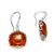 Gorgeous Baltic Amber earrings framed in Sterling Silver. Size is approx .5" square.