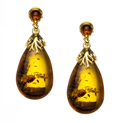 Beautiful honey amber and gold plated sterling silver stud earrings. Size is approx 1.5" x .5"