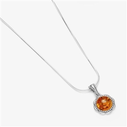 Round honey amber pendant in a nicely detailed sterling silver frame. Size is approx  0.75" high x 0.5" wide..
Please note that silver chain is NOT included.