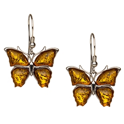 Baltic amber make up the wings of these beautiful sterling silver earrings. Size is approx 1.25" x 0.5".