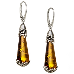 Honey amber drops suspended in sterling silver filigree on top and bottom.  Size is approx 2" x 0.5".