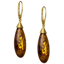 Honey amber drops suspended in gold plated sterling silver. European hooks.  Size is approx. 2" x 0.5".
