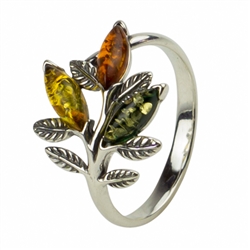 Artistic sterling silver ring highlighting three amber cabochons. Size is approx 0.5" x 0.75".