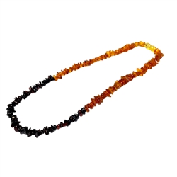 Multi-Color Rainbow Amber Chip Necklace. Cherry, light and dark cognac amber chips are set on a durable string, finished with a screw clasp. 16â€³ long genuine Baltic amber necklace.