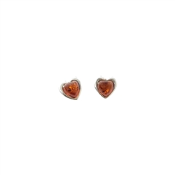 Cognac Amber Heart Stud Earrings. Heart-shaped amber stones set in .925 sterling silver. Genuine Baltic amber. Size is approx 04." x 0.4".