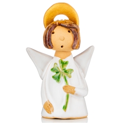 Our beautiful little ceramic angel is carrying her favorite four leaf clover. Totally hand made and painted in Poland. Stamped and artist initialed on the bottom. No two angels are exactly alike as they are all hand made and painted.