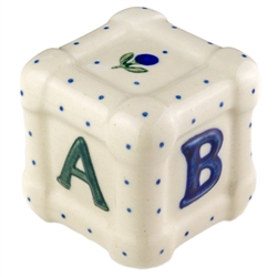 This stoneware 2.5" ABCD Cube is handcrafted in Boleslawiec, Poland. Ceramika Artystyczna's high quality glaze makes it easy to clean, impervious to abrasives and the vibrant colors will never fade. As an extremely durable stoneware, it will not crack or