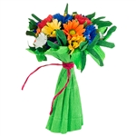 This beautiful floral bouquet is made by a folk artist family from the Nowy Sacz area. This bouquet is made of colorful crepe paper and supporting wire. Made in Poland entirely by hand. No two are exctly alike. Size is approx 8" x 5" x 4"