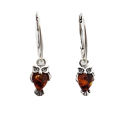 Cognac Amber Sterling Silver Owl Earrings On Hooks. Teardrop-shaped amber stones set in .925 sterling silver. Genuine Baltic amber Size is approx 1" x 0.25"