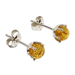 Baltic Amber Sterling Silver Earrings. Citrine Amber Sterling Silver Stud Earrings. Round-shape amber stones set in .925 sterling silver. Genuine Baltic Amber jewelry