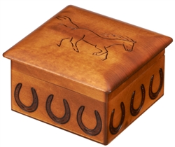 This box has the image of a galloping horse hand carved onto its lid. A horseshoe pattern around the sides of the item completes the piece. Handmade in the Tatra Mountain region of Poland. Size is approx 5" x 5" x 3".