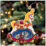 Shining in holiday colors of rich red, bright gold, emerald green and midnight blue, this ornate rocking horse embodies Chistmas tradition. The wintery vignitte beneath with Santa and his noble steed.
DIMENSIONS: 5.5 in (H) x 5 in (L) x 1.5 in (W)