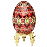 This beautifully designed and executed goose egg is hand painted by our artist from Canada using the traditional batik method. The egg has been emptied through two small holes at each end of the egg.