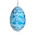 This beautifully designed egg is dyed one color, then white wax is melted and applied to form an intricate design which is left on the surfce. The egg is emptied and strung with ribbon for hanging.