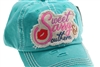 Teal ponytail cap says, sweet sassy & southern