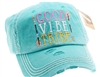 Turquoise ponytail cap says Good Vibe Tribe